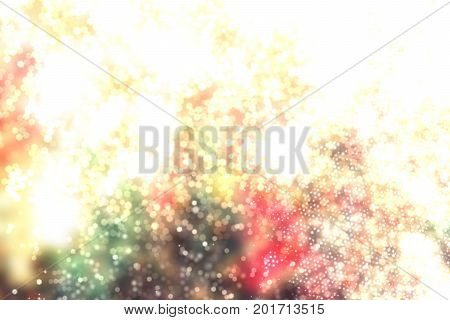 Christmas background with glitter lights. Defocused abstract texture