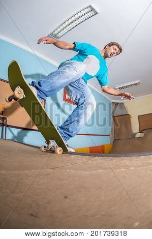 Skateboarder Performing A Trick