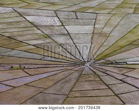 Close up view of Linko, unique Spider's Web Rice Fields on Indonesian island of Flores, showing workers near the centre and divisions to share land