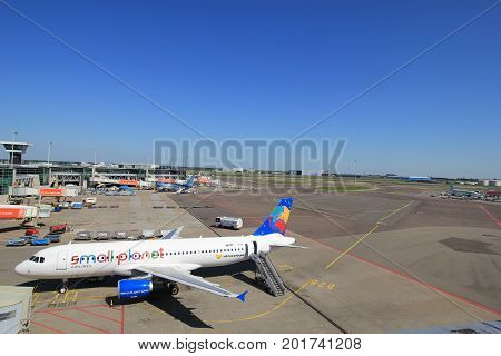 Amsterdam The Netherlands - May 26th 2017: D-ABDB Small Planet Airlines Germany Airbus A320 at the gate at Schiphol International Airport
