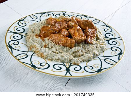 Meat On A Bed Of Baked Eggplant