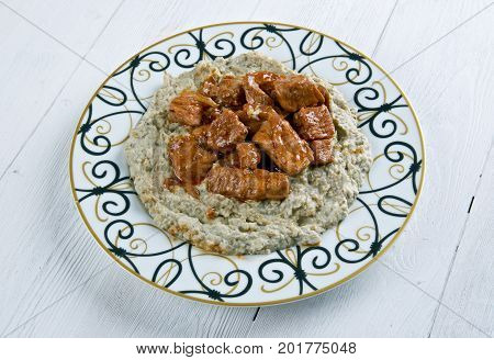 Meat On A Bed Of Baked Eggplant