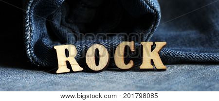 Wooden Letters And Jeans