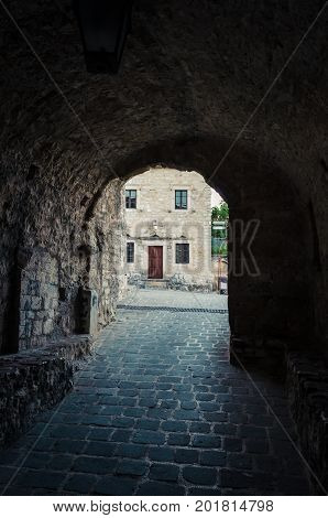 Main entrance to the Stari Grad of Ulcinj Montenegro. The gate of fortress in the Old town in a sunny summer day.
