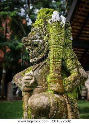 Rakasa Balinese Stone Sculpture Covered With Moss.