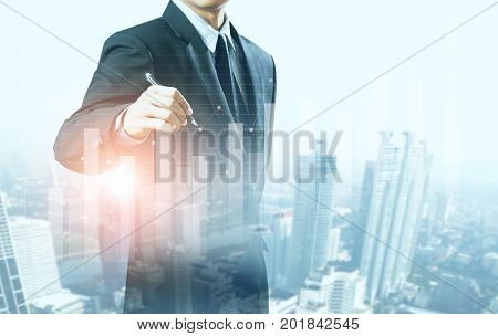 businessman present increasing graph with city background, business growth
