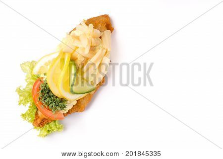 Danish specialties and national dishes high-quality open sandwich isolated on white background. fish fillet and garnished with remoulade and lemon