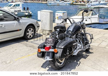 SPLIT, CROATIA - 12 JULY, 2017: Motorcycle Harley Davidson in the port in the parking lot.