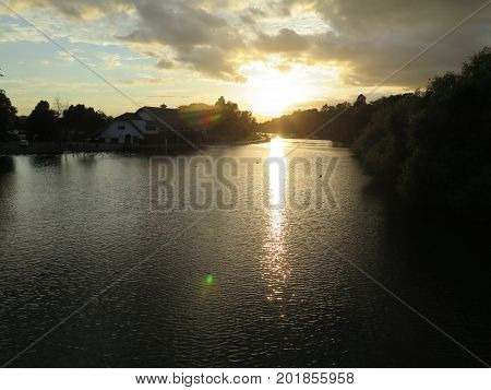 View of sun setting on River Thames Reading from Caversham Bridge