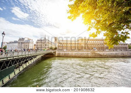 Landscape view on the riverside with Notre Dame basilica in Paris