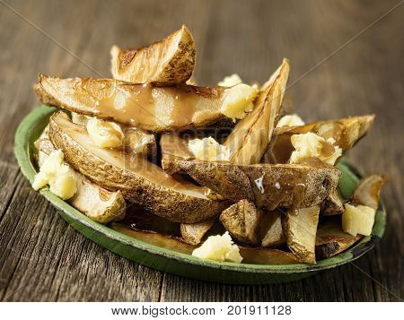 close up of rustic canadian quebecois poutine