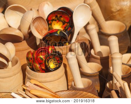 Wooden kitchen utensils. Сups and spoons. Kitchen Decor