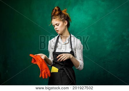 Perturbed and tired housewife close up.dressed in apron