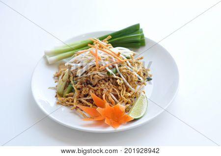 Crispy Chicken Pad Thai. Rice noodles stir-fried with egg, scallions, bean sprouts and ground peanuts topped with crispy chicken.