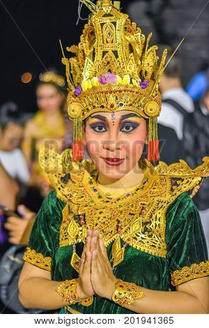 Uluwatu, Indonesia - August 29, 2017: A Balinese dancer and actor perform in the Kecak ceremony.