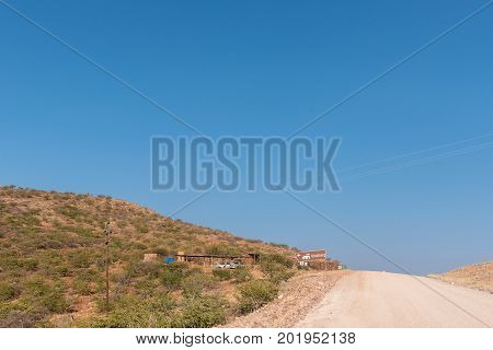 GROOTBERG PASS NAMIBIA - JUNE 28 2017: Turn-off to a lodge at the top of the Grootberg Pass on the C40-road between Kamanjab and Palmwag in the Kunene Region of Namibia