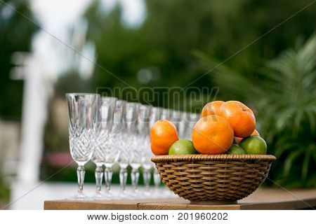Detail of a table dish with glasses at an event on a sunny summer day. party in a Villa on the shore of the sea