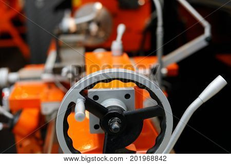 Lathe machine with tailstock on the foreground. Selective focus.