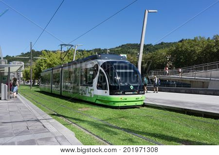 BILBAO, SPAIN - AUGUST 17, 2017: A Bilbao Metro Tram near the Riverwalk. It is the third largest Metro company in Spain by number of passengers carried (87,133,034 in 2013).