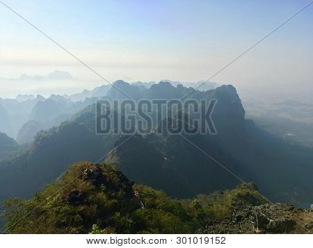 Breathtaking View Of Mountains Around Mt Zwegabin In A Mist Near Hpa An, Burma