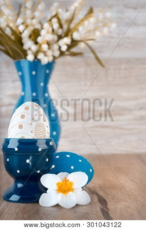 Easter Decorations In Blue And White, Text Space, Shallow Dof, Focus On The Egg