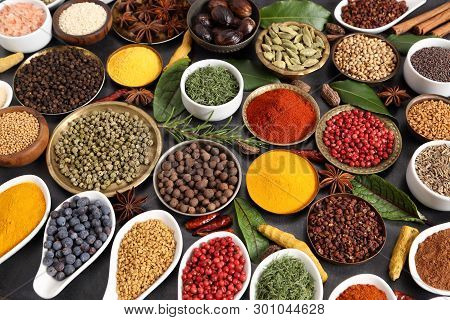 Aromatic Spices And Herbs In Metal And Ceramic Bowls. Top View.