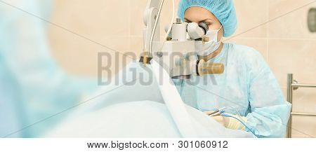 Ophthalmology Laser Microscope Operation. Doctor In Clinic. Patient Eye Treatment. Myopia And Catara