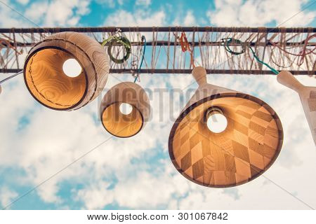 Wooden Round Design Lamps In Beautiful Sky