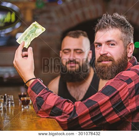 Friends Relaxing In Pub. Hipster Brutal Bearded Man Spend Leisure With Friend At Bar Counter. Order 