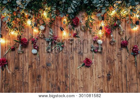 Rustic Wedding Photo Zone. Hand Made Wedding Decorations Includes Photo Booth  Red Flowers. Garlands