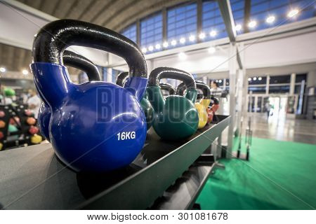 16 Kilogram Kettlebells For Exercise Placed On Shelf In Gym