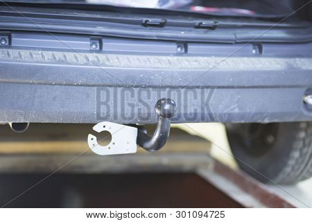 Towbar On The Car. Installation Of The Trailer Device On The Car.