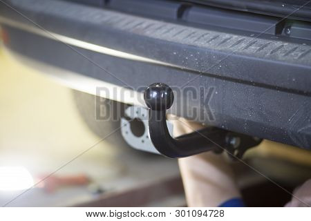 Towbar On The Car. Installation Of The Trailer Device On The Car.
