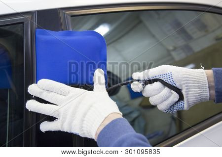Opening The Car With A Pillow. Carjacking. Hijacker.