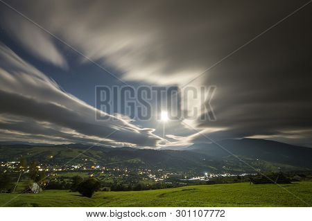 Summer Night Mountain Panorama. Green Grassy Mountain Clearing, Spruce Trees On Blue Evening Sky Cop