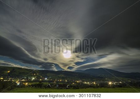 Summer Night Mountain Panorama. Green Grassy Mountain Clearing, Spruce Trees On Blue Evening Sky Cop