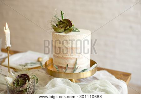 Elegant White Wedding Cake With Flowers And Succulents In Boho Style. Rustic Wedding Cake.