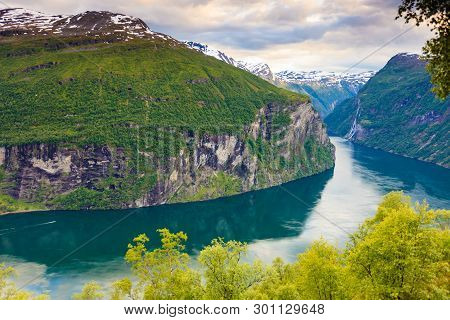 Tourism Vacation And Travel. Beautiful View Over Magical Geirangerfjorden From Flydalsjuvet Viewpoin