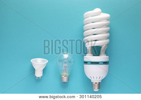 Close Up View Of White Light Bulb Isolated On Pink.
