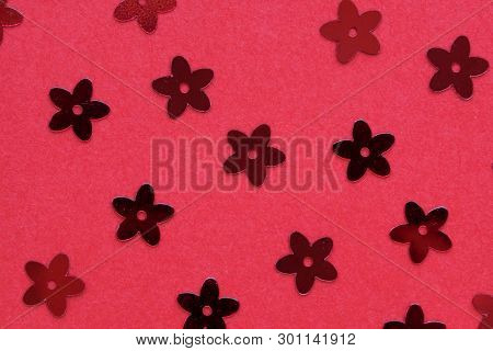 Red Palettes In The Form Of Flowers On A Red Background, A Festive Concept.  Place For Text.