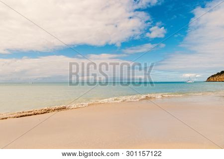 Idyllic Scene Sand Tropic Beach Wave Blue Sea. Everyone Should Visit Tropic Resort St.johns Antigua.