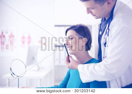 The Patient And His Doctor In Medical Office