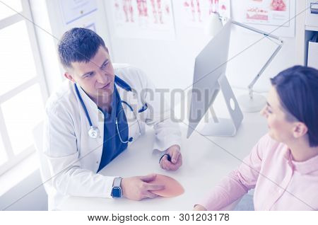 The Patient And His Doctor In Medical Office