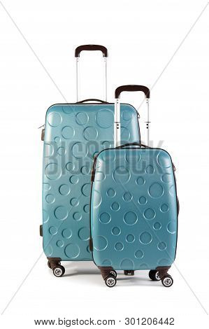 Two Green Suitcases With Handles And Wheels Isolated On White Background. Small And Big Suitcases. S