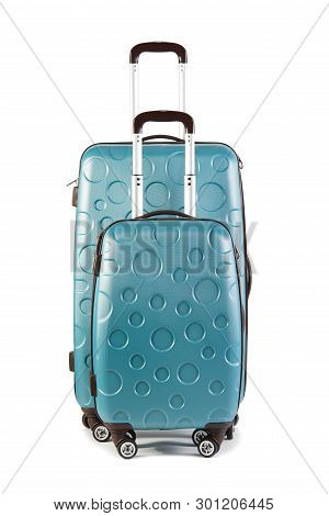 Check-in Luggage And Cabin Bag Isolated On White Background. Two Suitcases. Studio Shot.