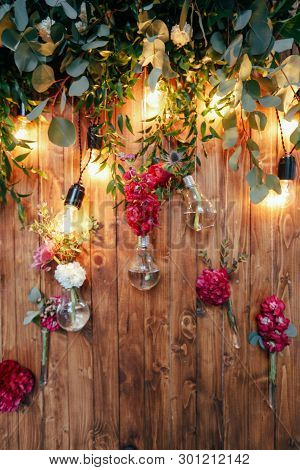 Rustic Wedding Photo Zone. Hand Made Wedding Decorations Includes Photo Booth  Red Flowers. Garlands