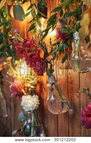 Rustic Wedding Photo Zone. Hand Made Wedding Decorations Includes Photo Booth  Red Flowers. Garlands
