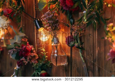 Rustic Wedding Photo Zone. Hand Made Wedding Decorations Includes Photo Booth  Red Flowers. Garlands