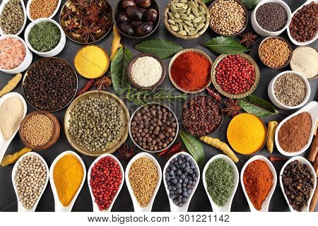 Aromatic Spices And Herbs In Metal And Ceramic Bowls. Top View.