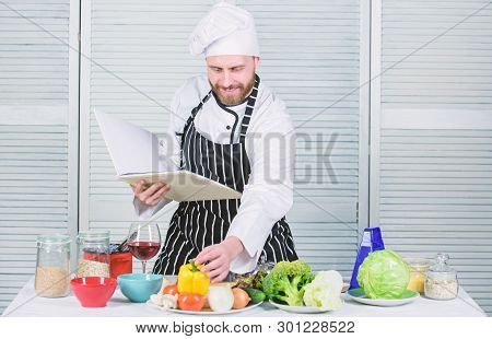 Book Family Recipes. Ultimate Cooking Guide For Beginners. According To Recipe. Man Bearded Chef Coo